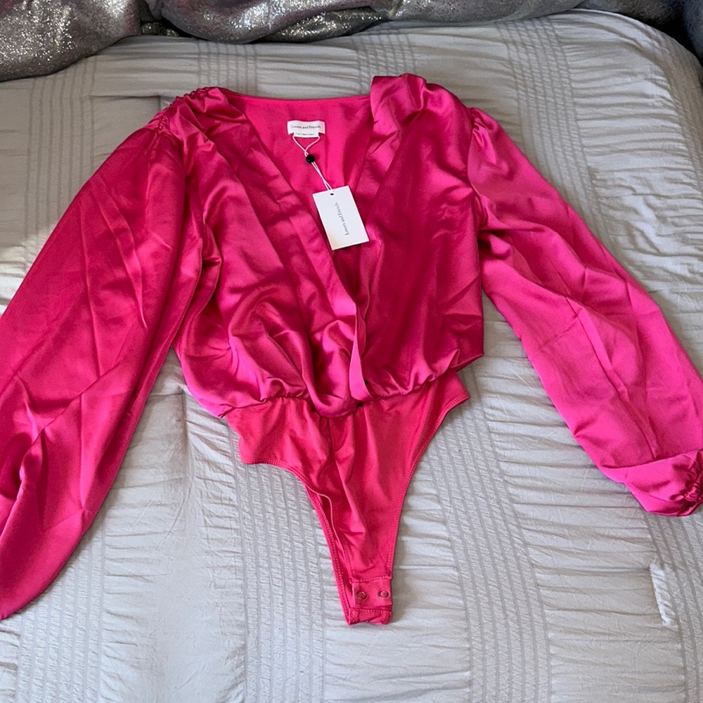 Hot pink bodysuit, deep V-neck